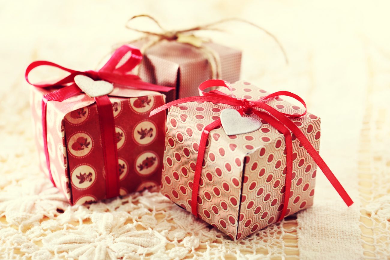 Add embellishments to create a cute finishing touch on DIY gift boxes